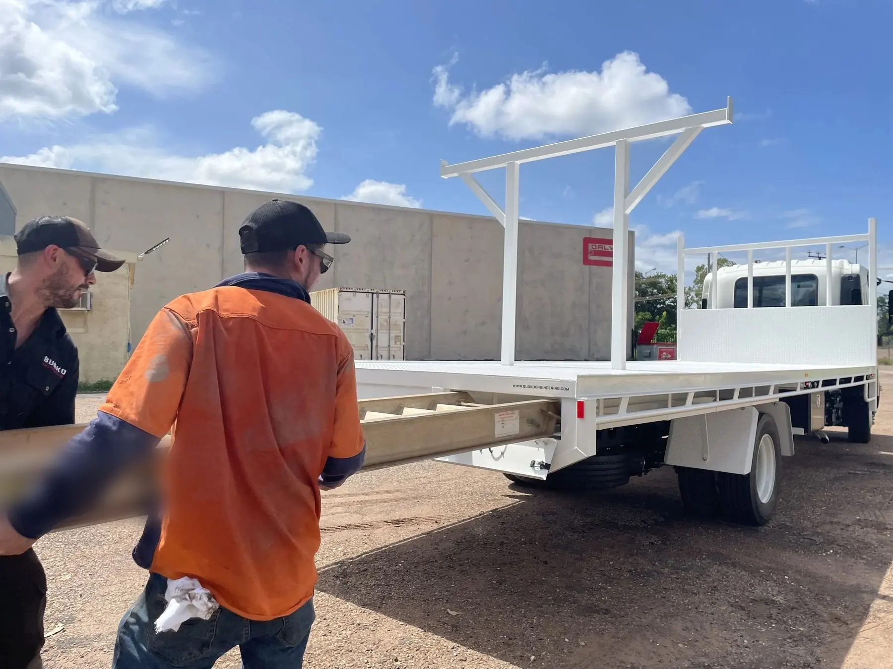Two Budko tradesmen with a finished truck tray